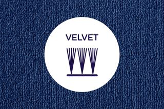 Cross section of cut yarns in a velvet carpet on a neutral carpet background